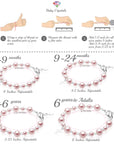 Sterling Silver Cross Charm Bracelet with Pink Pearls