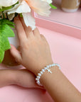 Sterling Silver Cross Bracelet with Freshwater Cultured White Pearls